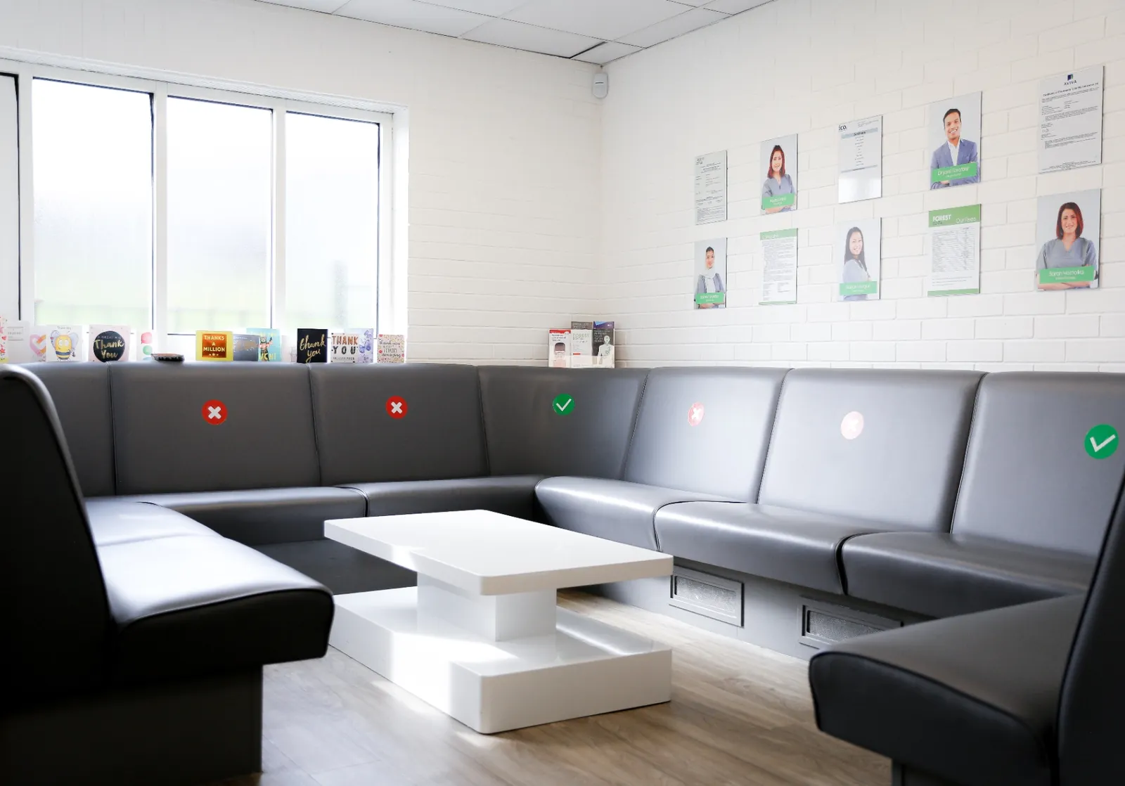 Forest Dental waiting room — natural light, thank-you cards on the window